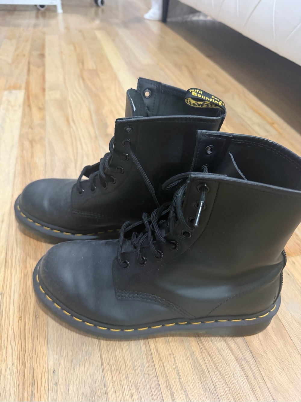 Dr. Martens Black Leather Combat Boots with Yellow Stitching